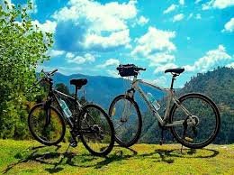 Biking with valley view